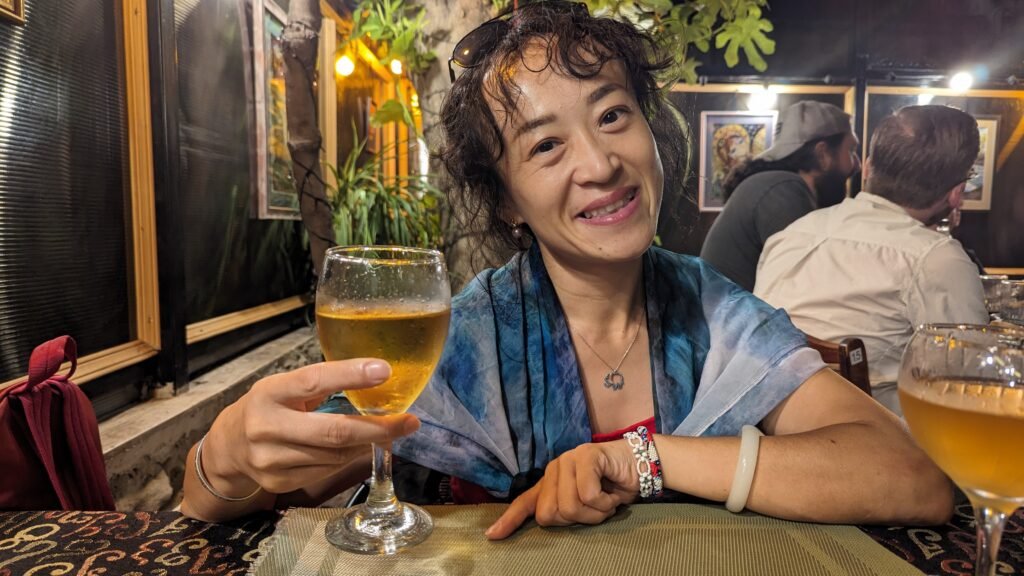 Chinese Girl enjoying Wine