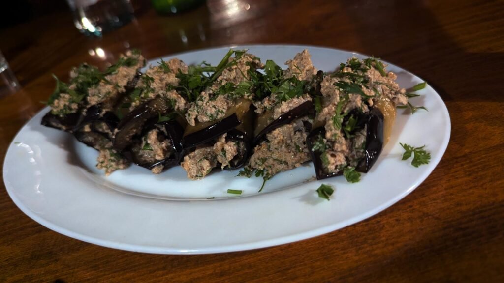 A classic egg plant salad the iconic stout at Chaba's Jazz Rock Cafe in Tbilisi, Georgia.