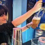 A professionel bar tender pouring beer out of the tab in Ficus Bar Tbilisi