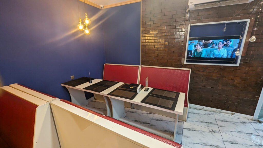 tables and seats inside the masala library restaurant