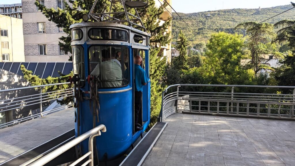 Guests in the narrow cable car at Vake Park